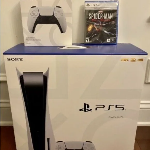 Brand new PlayStation5 with all accessories intact and also a Spider-Man disc